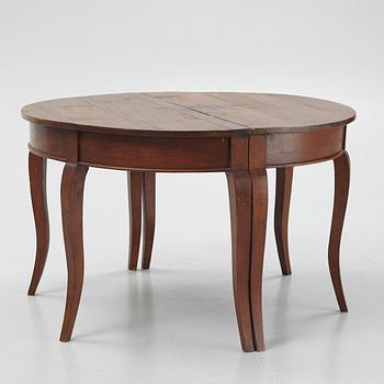 A stained pine table, 19th Century.
