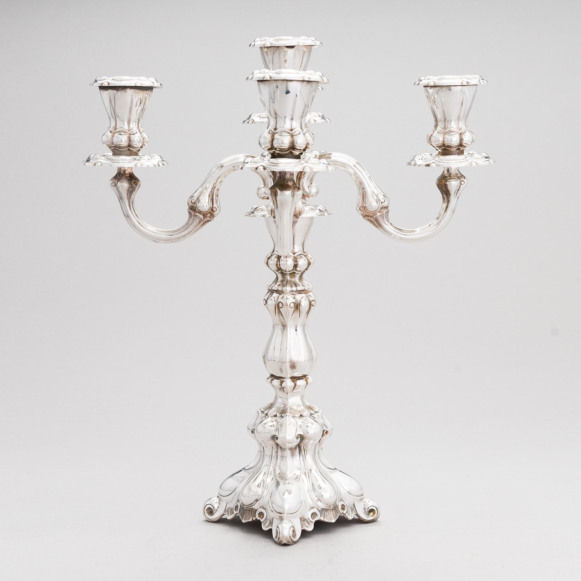 Kynttelikkö, hopeaa, Kultakeskus, Hämeenlinna 1987-88.