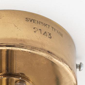 Josef Frank, a pair of model '2143' brass wall lamps, Firma Svenskt Tenn.