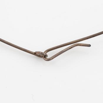 Dan Wolgers, collier med vattenpass.