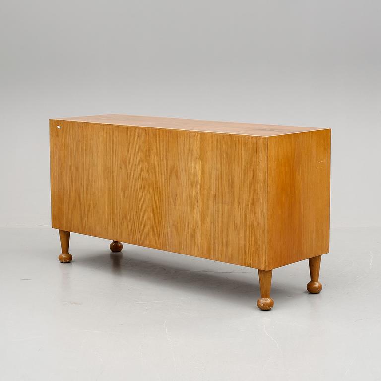 Josef Frank, an elm and mahogany sideboard, Svenskt Tenn, model 727, probably 1960's.