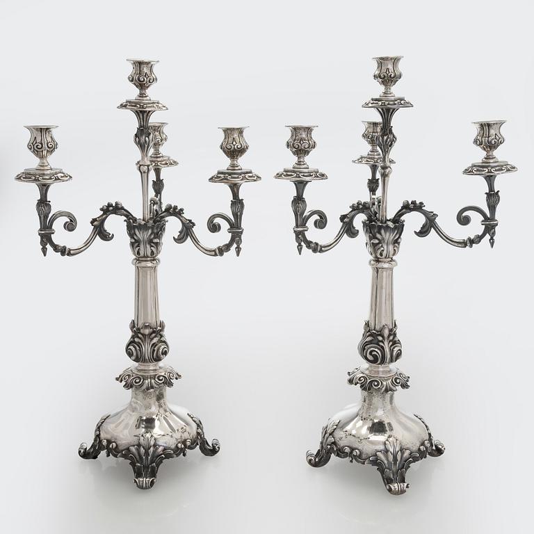 A pair of silver candelabra, maker marks of Carl Johan Tegelsten, Saint Petersburg 1850.