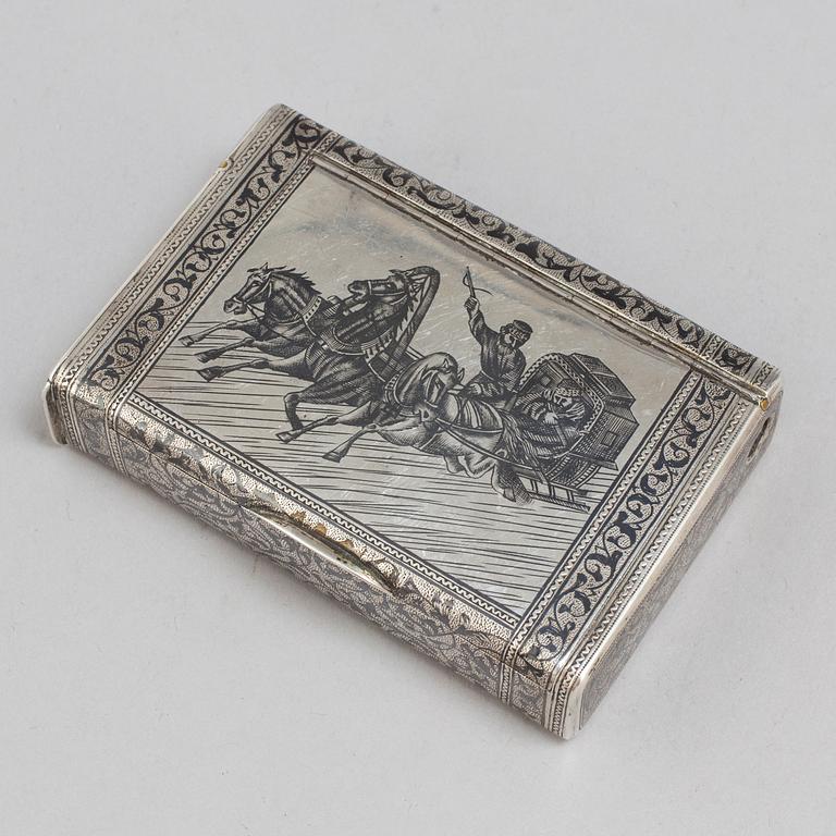 A parcel gilt silver case with niello, assaymaster Anatolij Artsybashev, Moscow 1889.