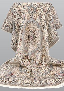 A Nain carpet, part silk, so-called 6LAA, c. 298 x 195 cm.