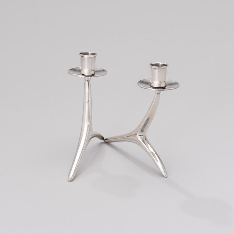 A silver candlestick for two candles, Auran Kultaseppä, Turku, Finland 1973.