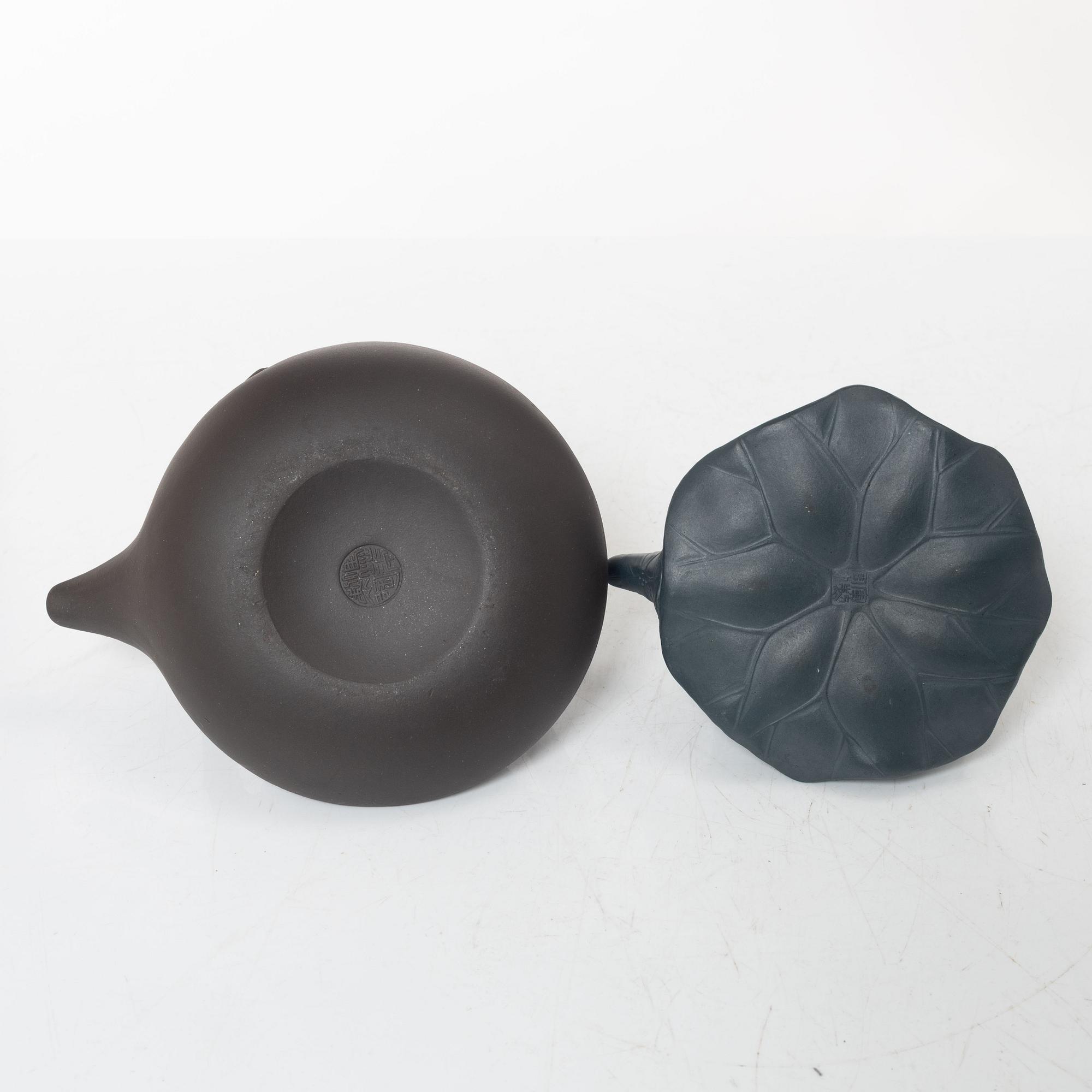 Two Chinese yixing ware teapots, 20th century.