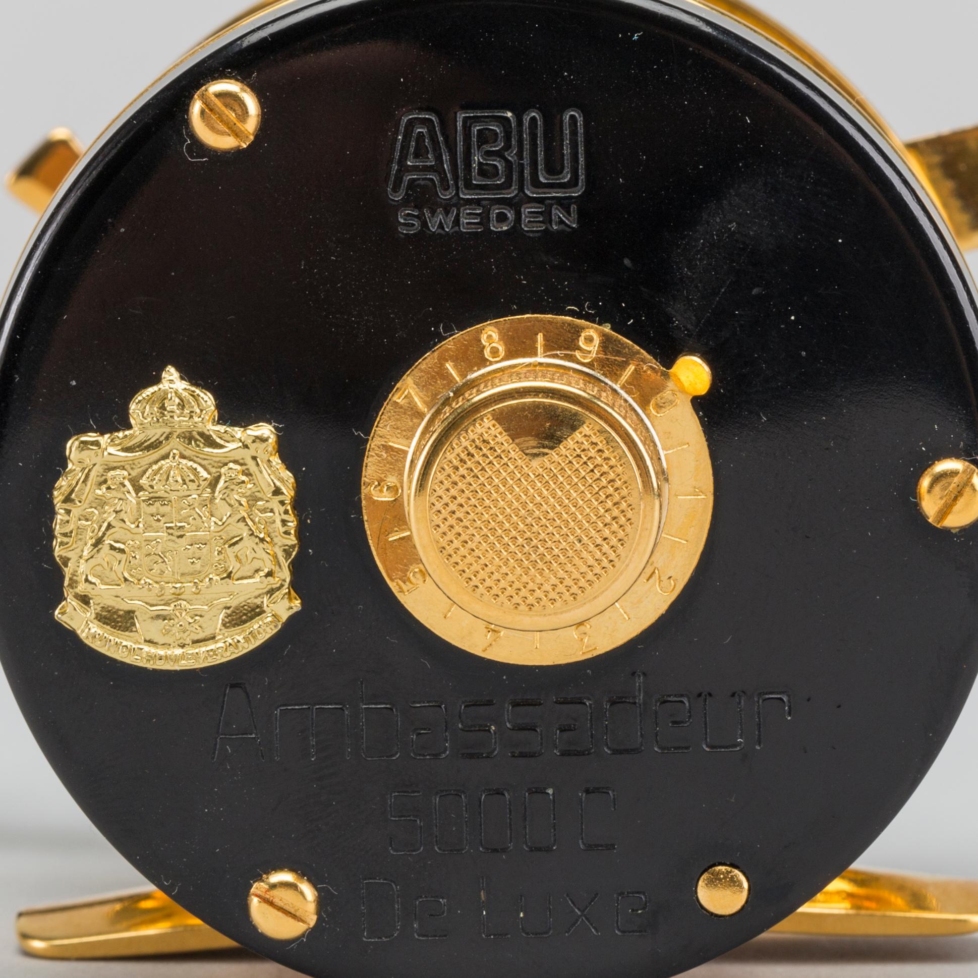 A guilded Ambassadeur 5000C De Luxe REEL BY ABU, SWEDEN. 1982