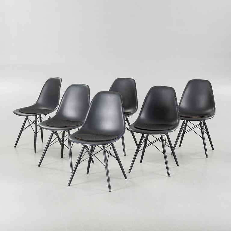 Six Charles & Ray Eames chairs by Vitra, 2013.