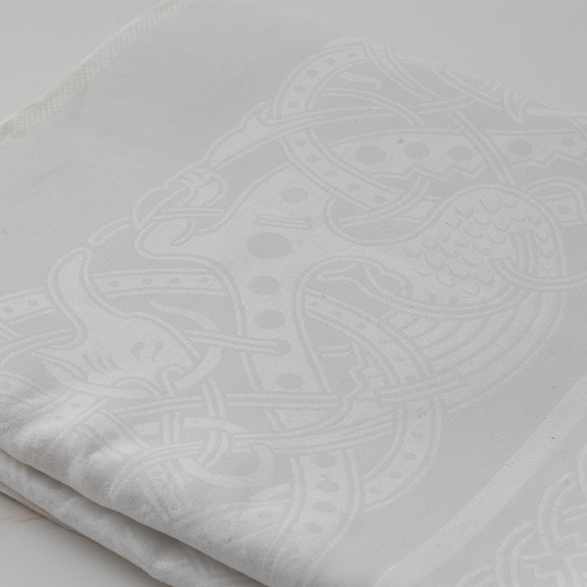 Two linen damask tablecloths.