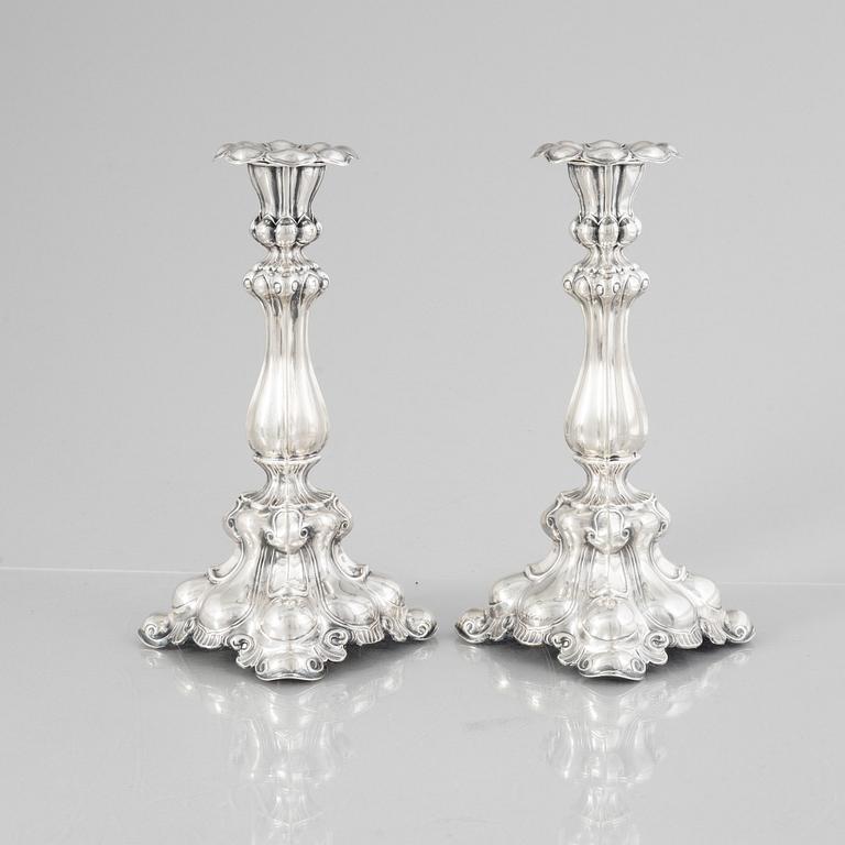 A pair of Baroque style silver candlesticks, mark of CG Hallberg, Stockholm 1936.