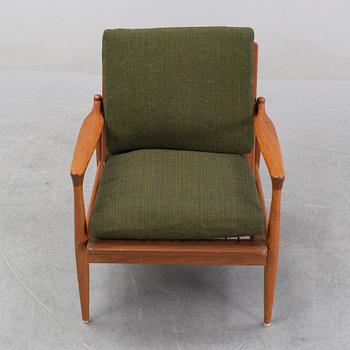 A 1950's/60's teak and oak easy chair.