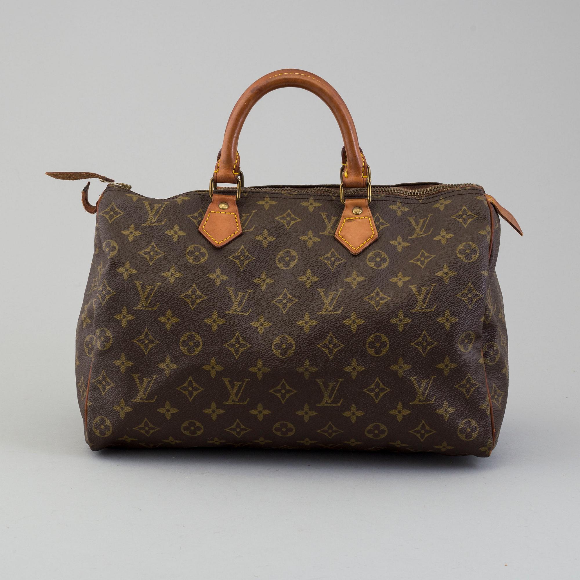 a Louis Vuitton "Speedy 35" bag.