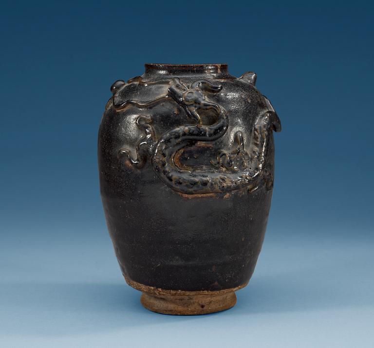 A black and brown glazed jar with a dragon in relief, Song dynasty (960-1279).