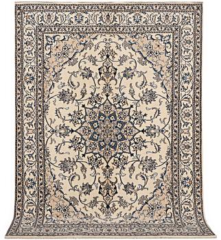 A rug, Nain, part silk, c. 237 x 167 cm.