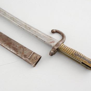 A french bayonet, dated 1875.