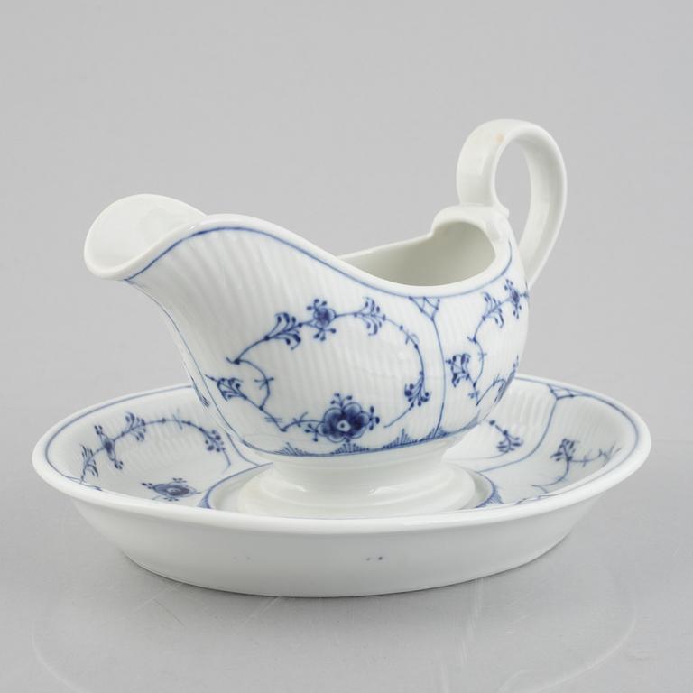 A 'Blue Fluted Plain' /'Musselmalet' sauce boat with stand, Royal Copenhagen, model 406 and 409, 1963 and 1893-1900.