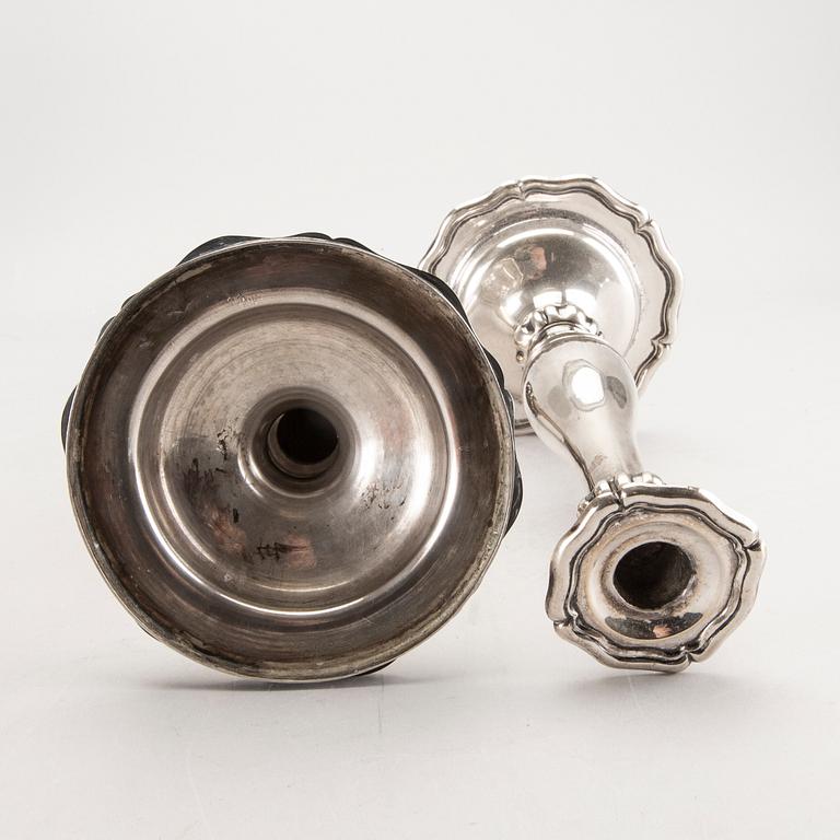 A pair of Austrian silver candle sticks Vienna 1852 weight 626 gr.