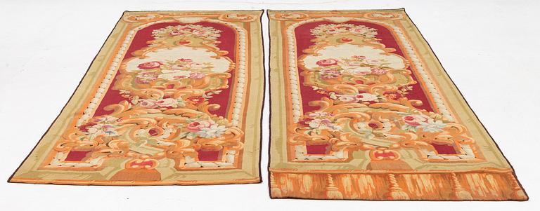 A pair of Antique french tapestries so called 'Entre Fenetre', c. 299-314 x 103 cm.