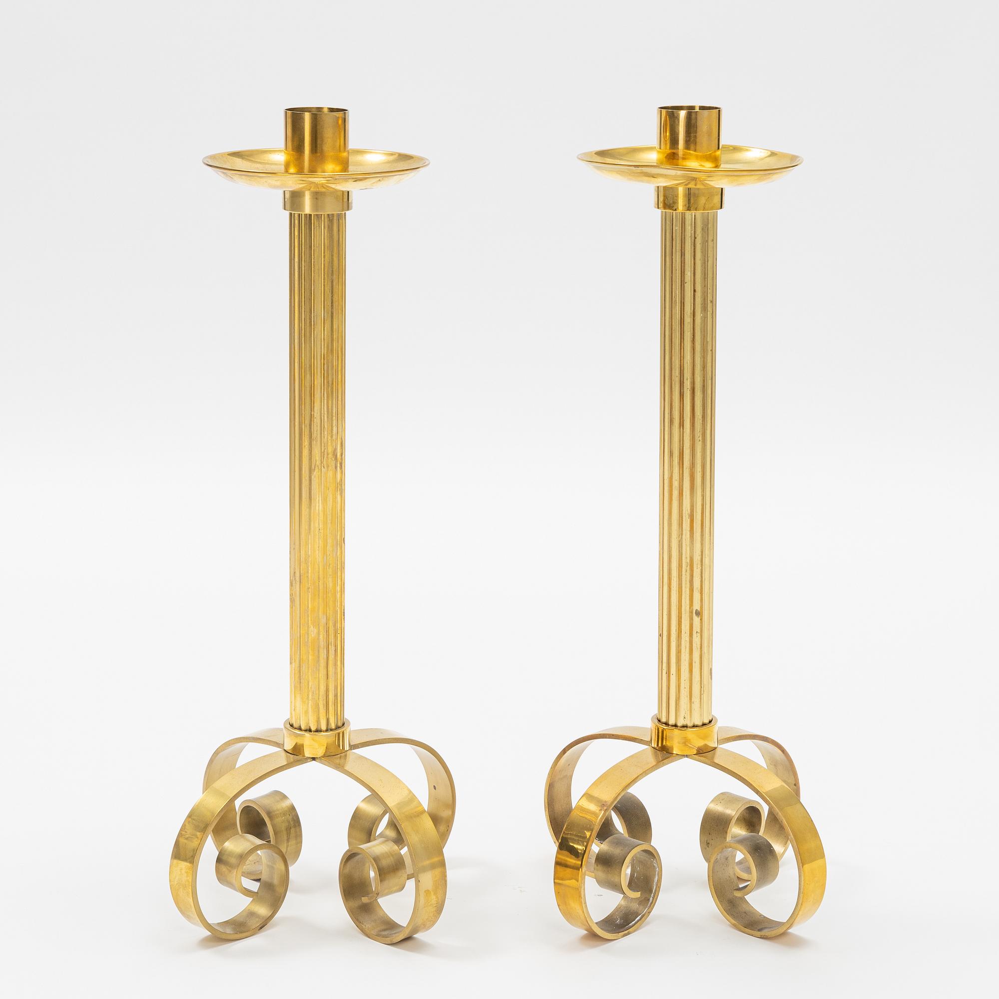 Ivar Ålenius-Björk, a pair of brass candle holders, Ystad Metall.