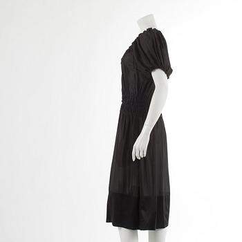DKNY, a black silk dress. Size M.