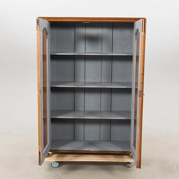Display cabinet circa 1900.