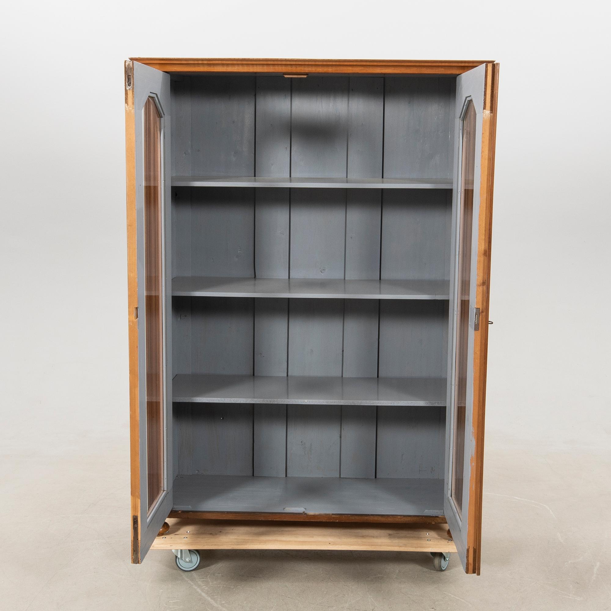 Display cabinet circa 1900.