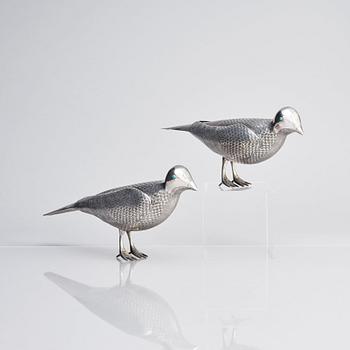 A pair of persian silver pigeons, the Qajar dynasty (1789–1925).