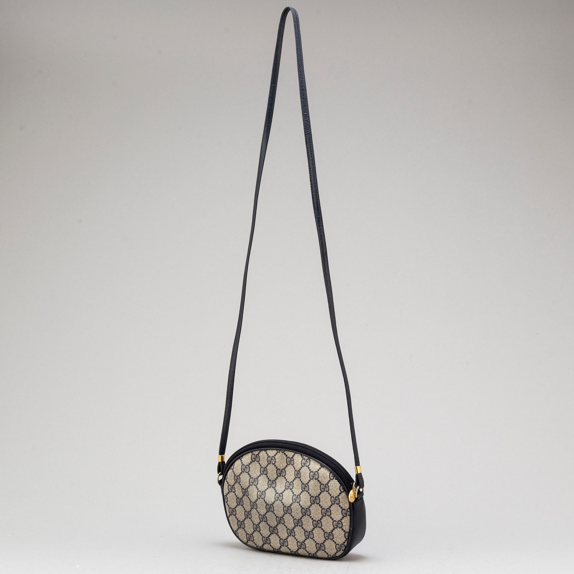a 1980's Gucci bag and purse.