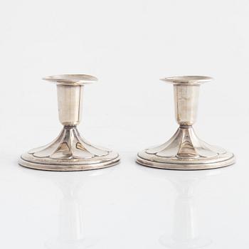 A pair of Swedish silver candlesticks, mark of K&EC, Gothenburg 1959.