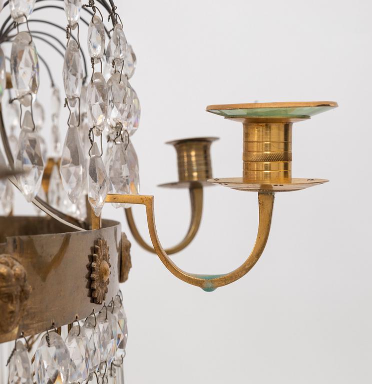 A late Gustavian early 19th Century twelve-light chandelier.