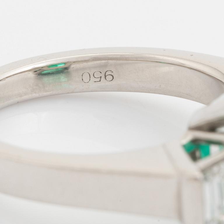 Emerald and trapezoid cut diamond ring.