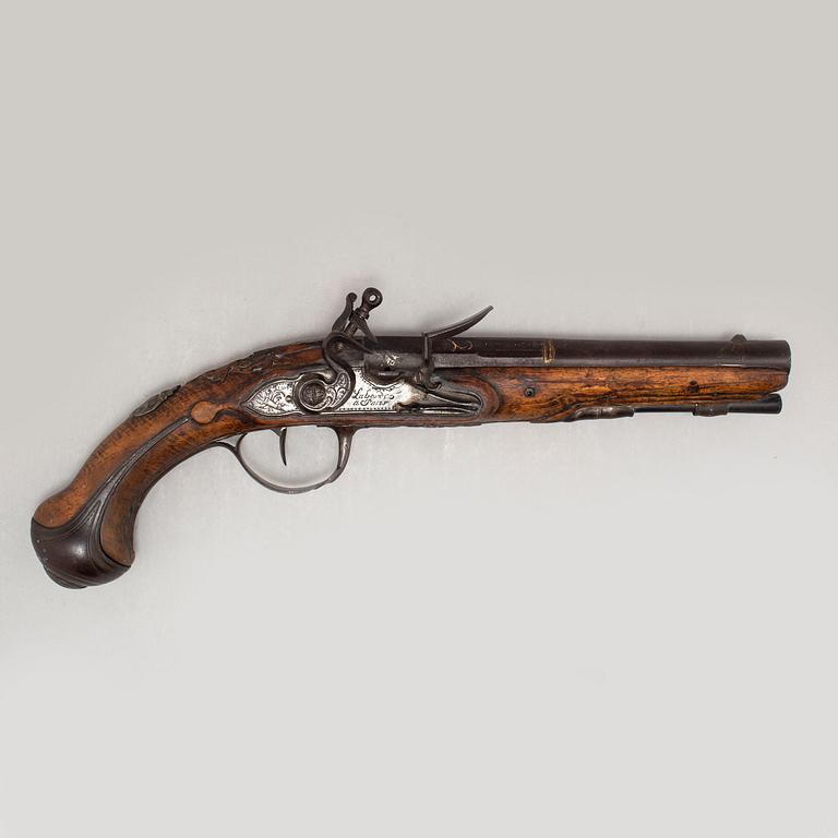 A French mid 18th century flintlock pistol marked "Laborde a Paris".