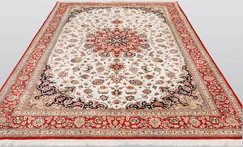 A silk Ghom carpet, 295 x 195 cm.