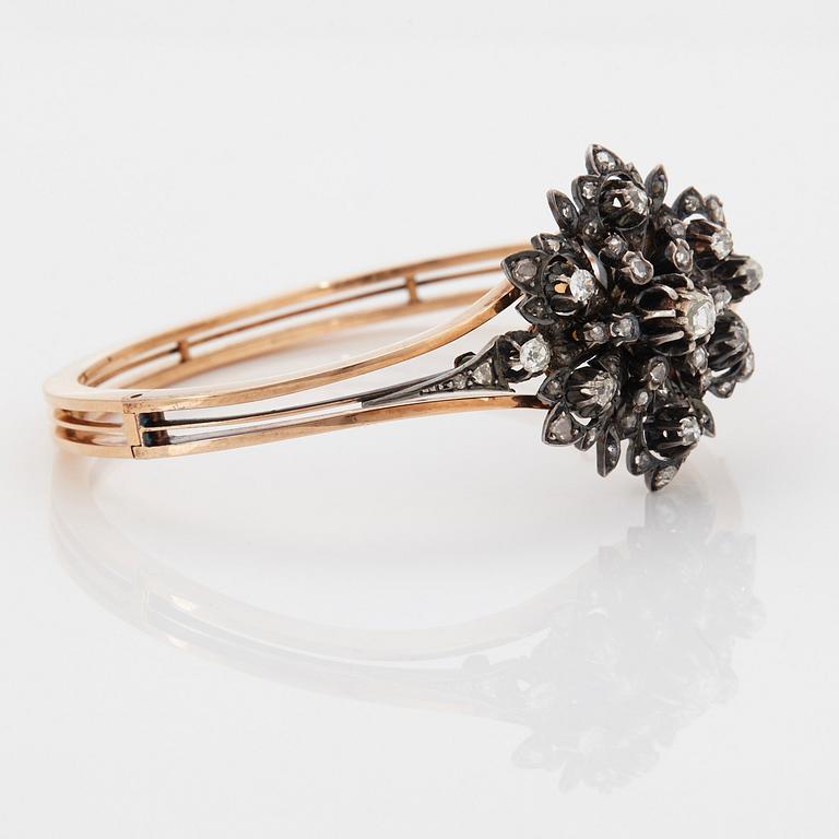 A 14K gold and silver bangle set with old- and rose-cut diamonds.