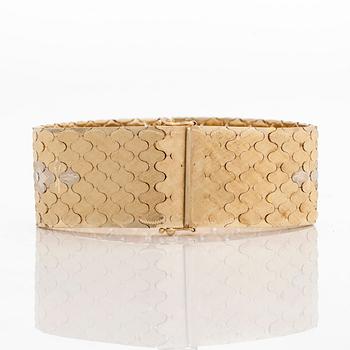 Armband i 14K trefärgsguld.