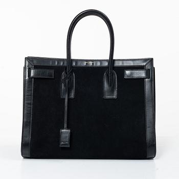 Yves Saint Laurent, a 'Sac du Jour' handbag.