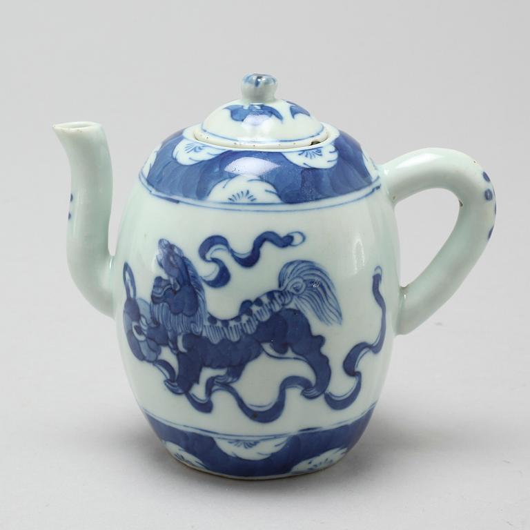 A 20th century porcelain tea pot.