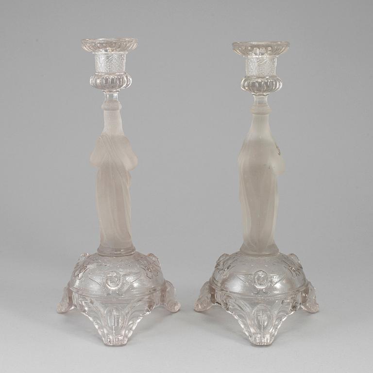 A pair of moulded glass candlesticks, late 19th century.