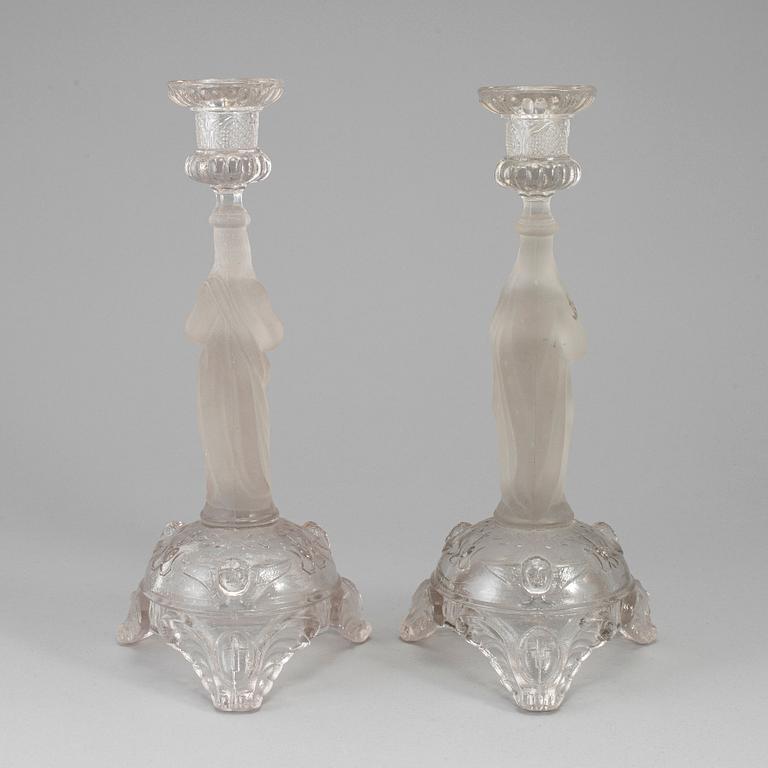 A pair of moulded glass candlesticks, late 19th century.