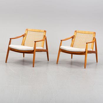 Hartmuth Lohmeyer, a pair of teak and rattan easy chairs, Gemla, Diö, 1950's/60's.