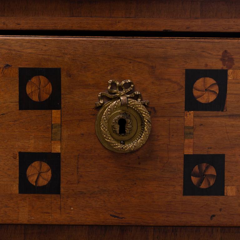 A mid european Louis XVI chest of drawers, ca 1800.