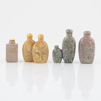 Eight snuff bottles, mottled stone, China, 20th century.