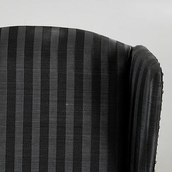 A pair of lounge chairs, late 20th / early 21st century.