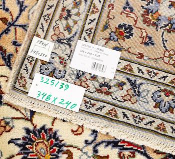 A Keshan carpet, c. 348 x 240 cm.