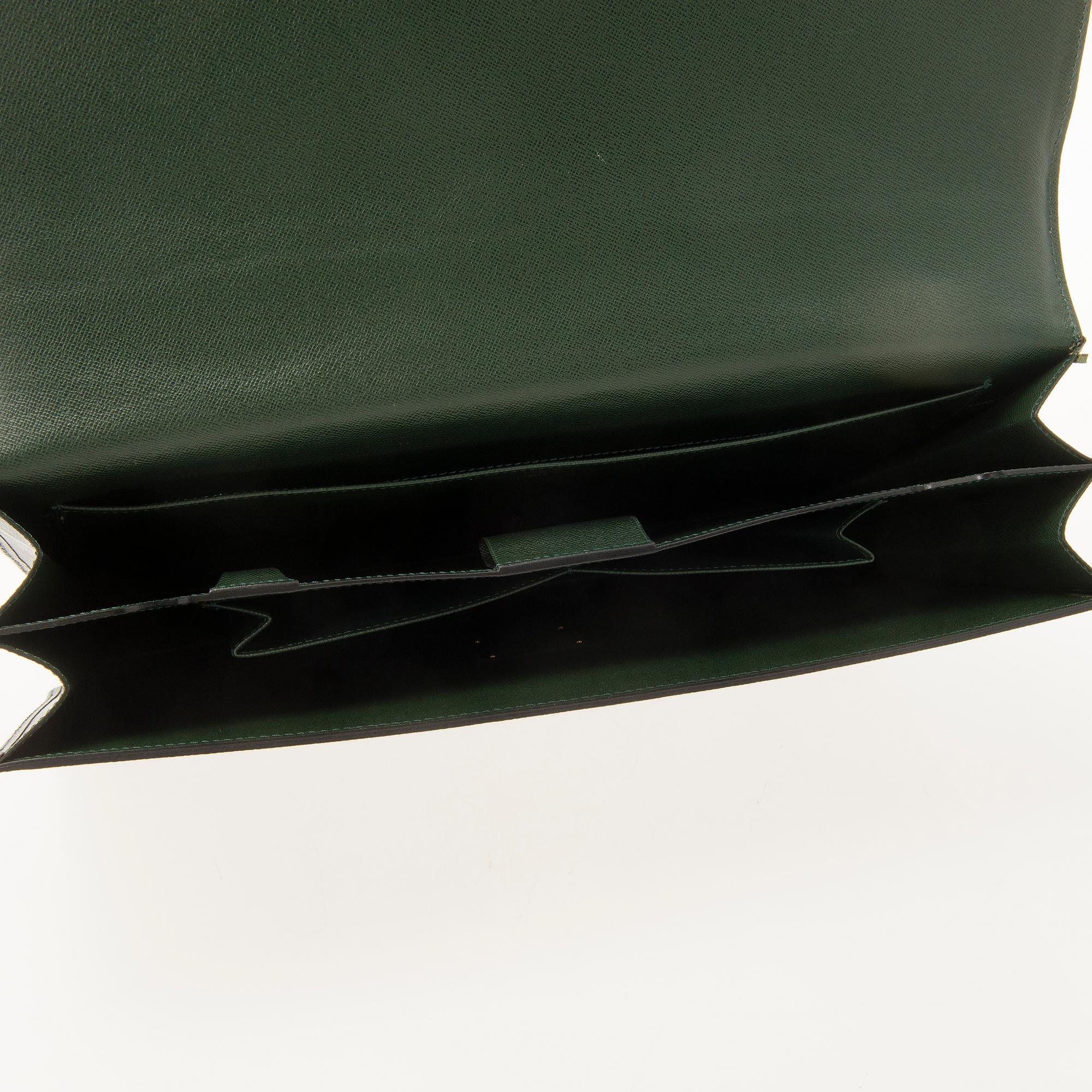 A Green Taiga Leather Serviette Laguito Briefcase.