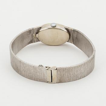 A Movado 18K white gold ladies watch.