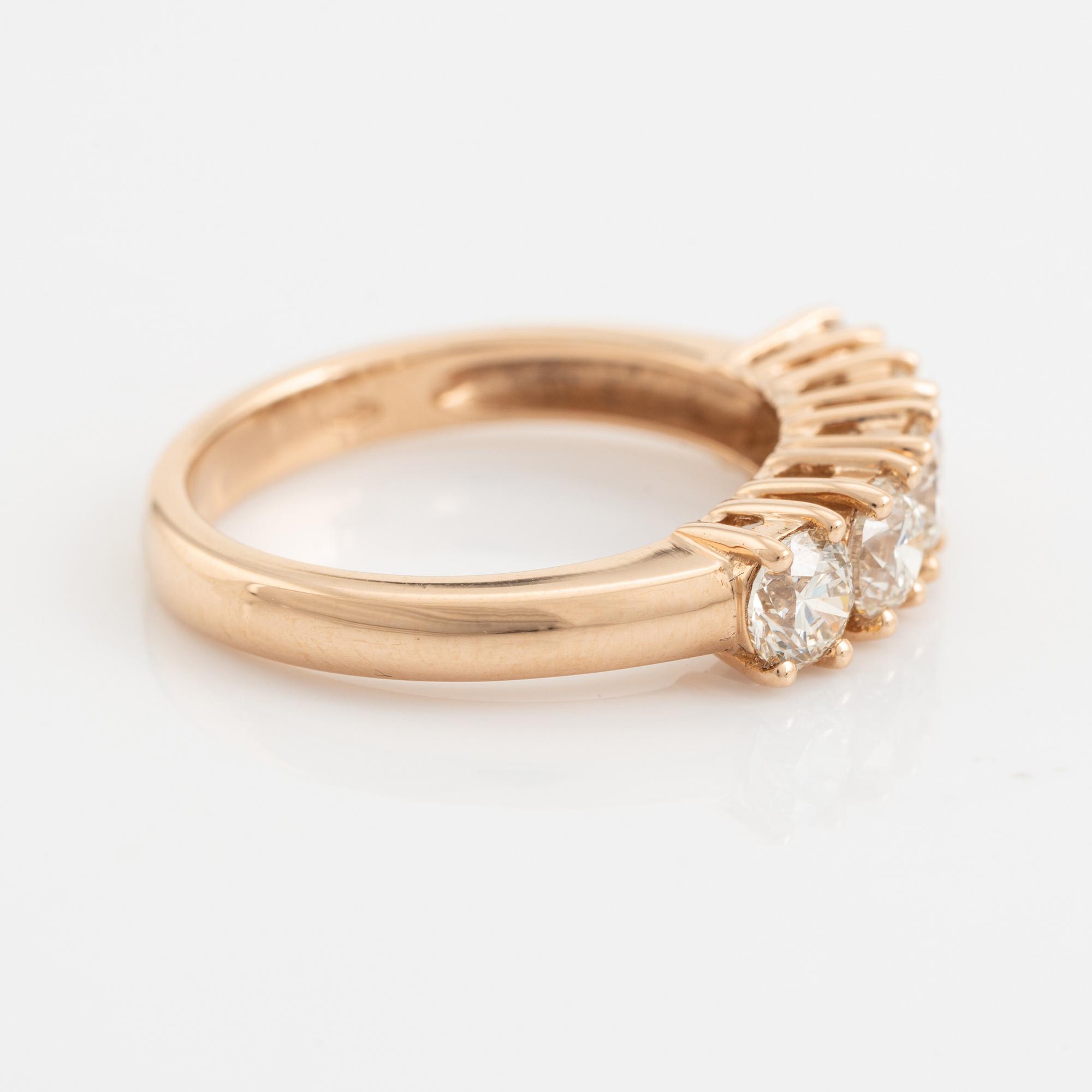 Brilliant cut diamond five stone ring.