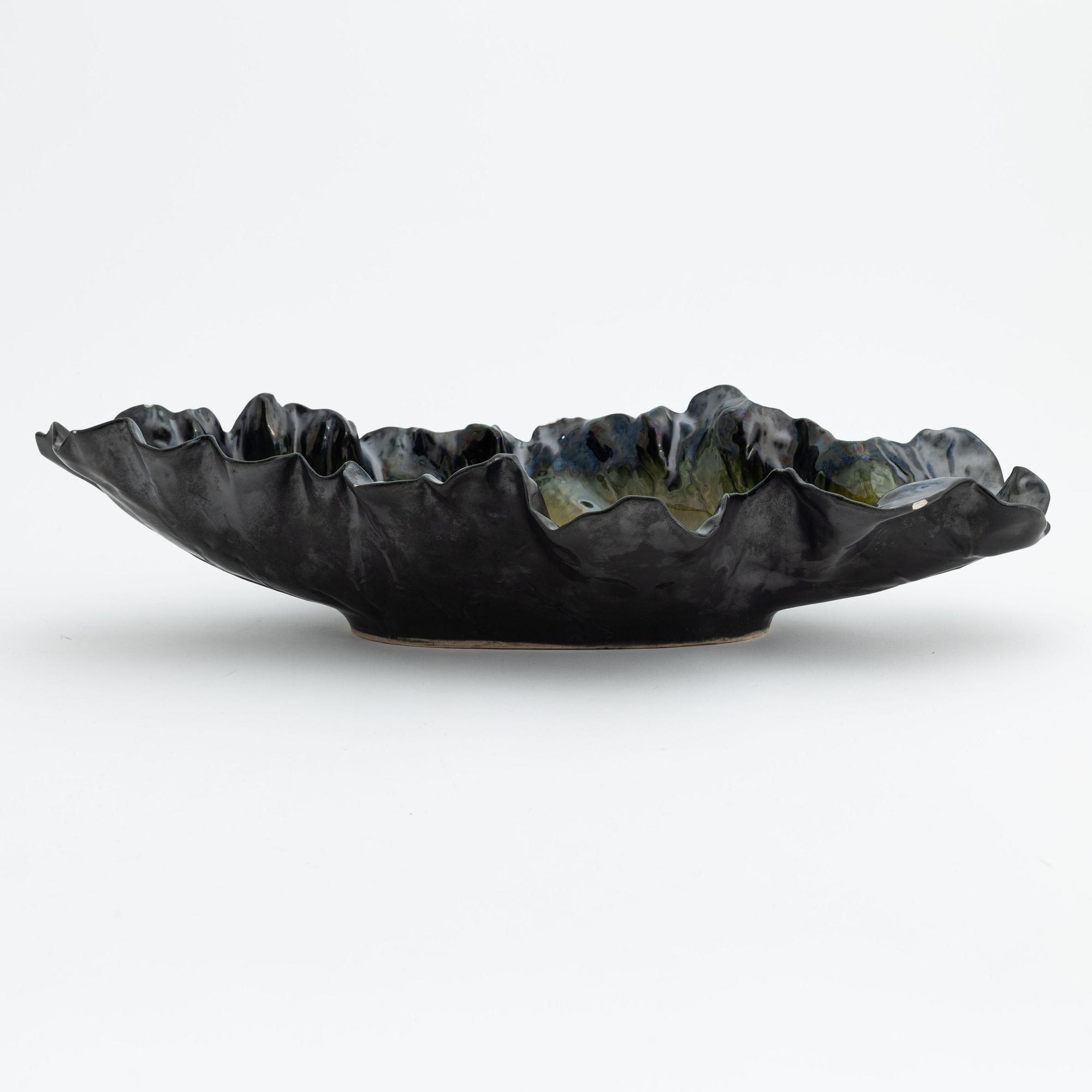 Pol Chambost, a glazed ceramic leaf shaped bowl or dish, signed.