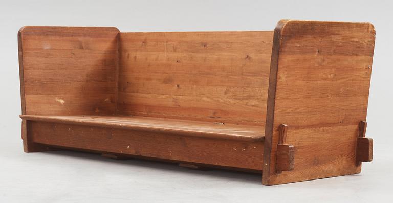 An Axel Einar Hjorth 'Lovö' stained pine sofa, Nordiska Kompaniet, Sweden 1930's.