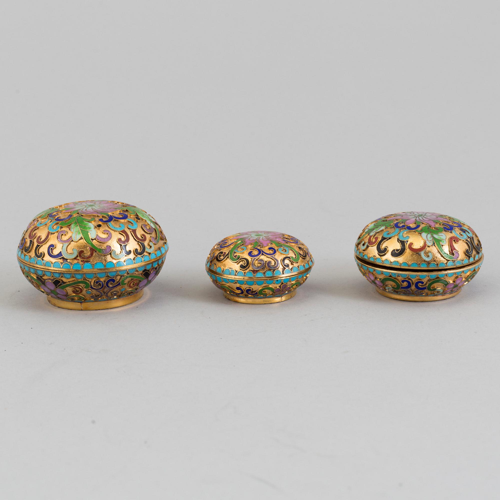 Three small boxes, two eggs and a bell, enamel, probably China, second half of th 20th century.